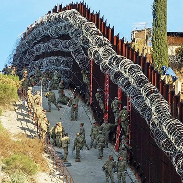 Concertina razor wires are installed on the country boundary
